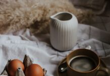 다이어트 성공을 위한 영양 가득한 아침식사의 중요성 three eggs on white ceramic plate beside brown ceramic mug