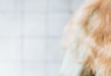 소화 기관을 튼튼하게 만드는 음식과 운동법 woman in white dress holding clear glass mug with green leaf