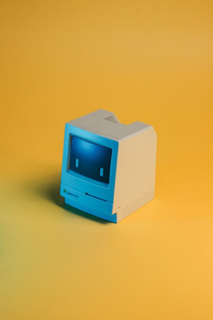 Photo by insung yoon A miniature, vintage macintosh computer toy.