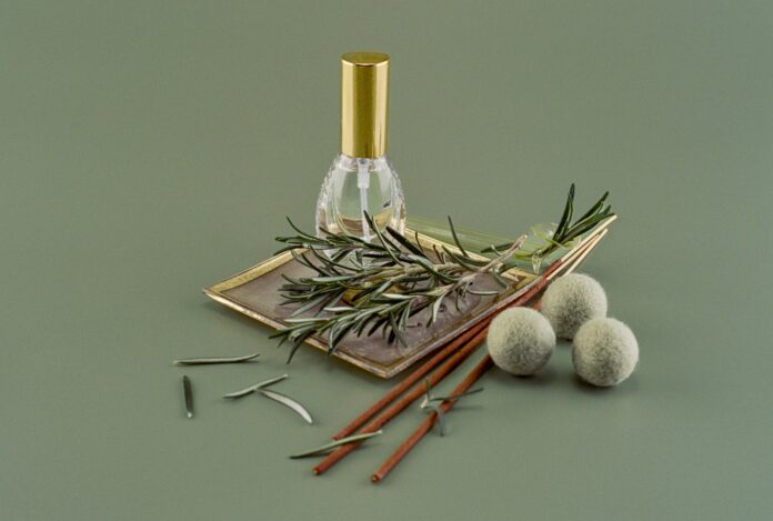 a bottle of perfume sitting on top of a table