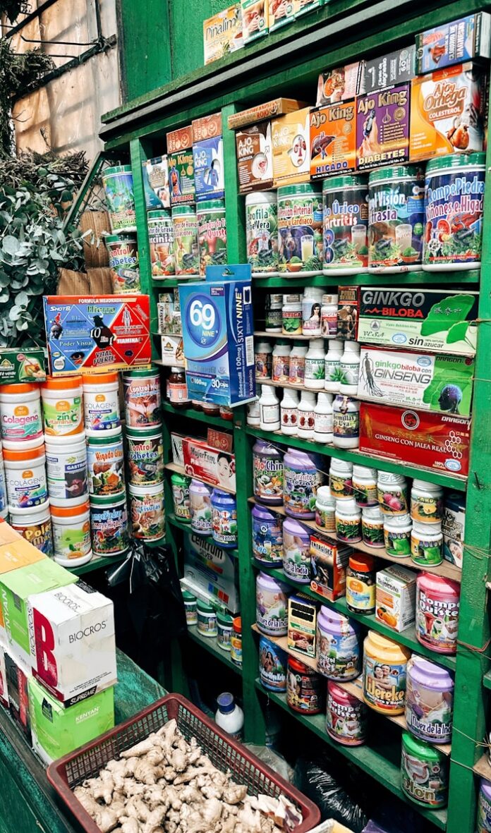 Photo by Diego Mejía Shelves filled with various health supplements and products.