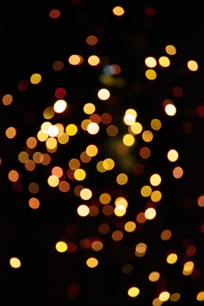 Photo by Thilak Mohan yellow and red bokeh lights